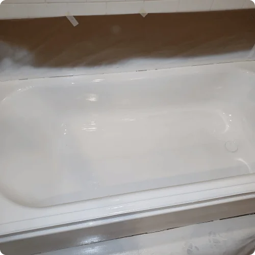 Refinished white bathtub with a glossy finish