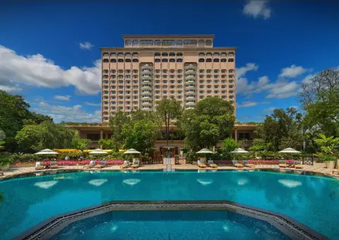 Luxury hotel with outdoor swimming pool and landscaped gardens