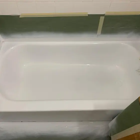 Refinished white bathtub with a glossy finish