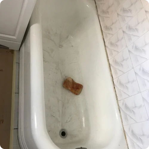 Stained white bathtub before refinishing